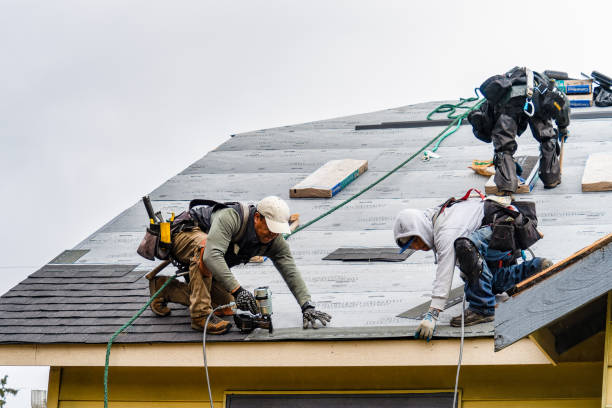 Professional Storm Damage Roof Repair technician working in Chelan Falls, WA